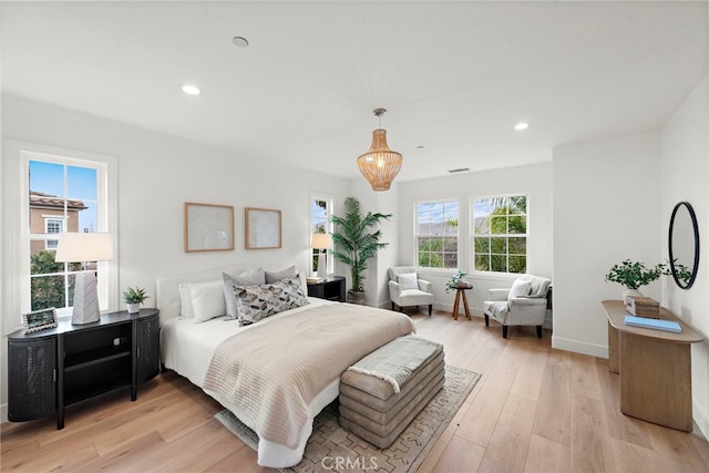 bedroom featuring light hardwood / wood-style floors