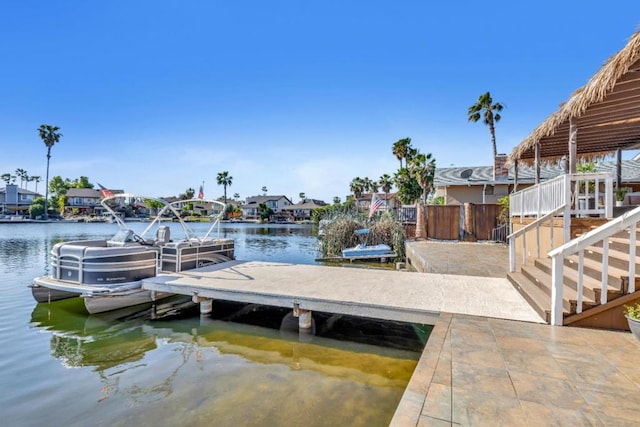 dock area featuring a water view