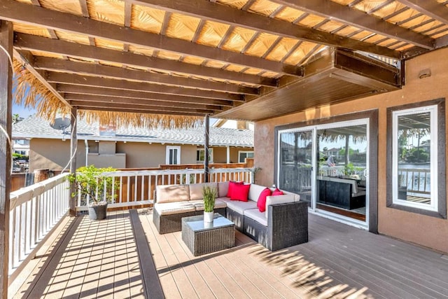 deck featuring outdoor lounge area