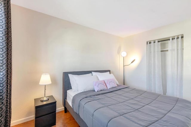 bedroom featuring hardwood / wood-style floors