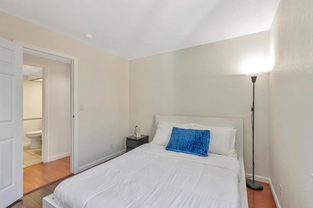 bedroom featuring hardwood / wood-style flooring