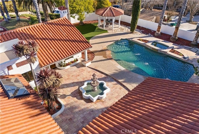 view of pool featuring a gazebo and a patio