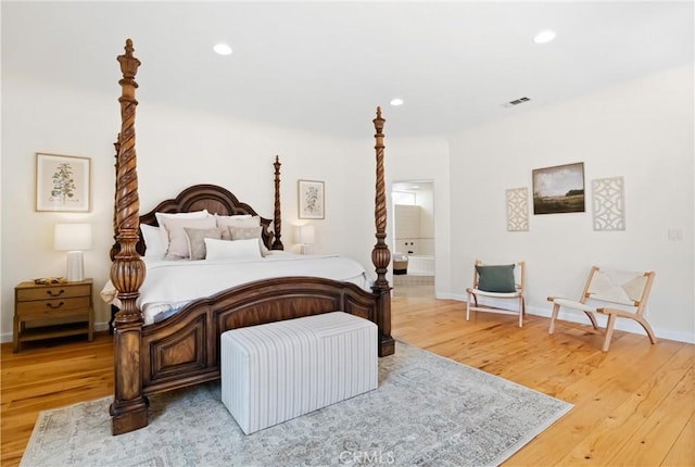 bedroom featuring light hardwood / wood-style floors