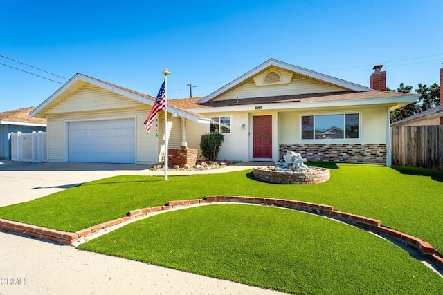 view of front of home featuring stucco siding, concrete driveway, an attached garage, a front yard, and fence