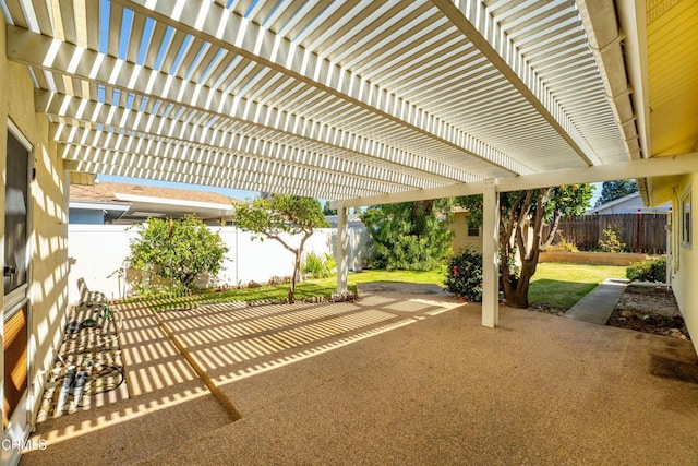 view of patio / terrace with a fenced backyard and a pergola