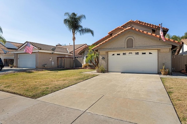 view of front facade featuring a garage and a front yard