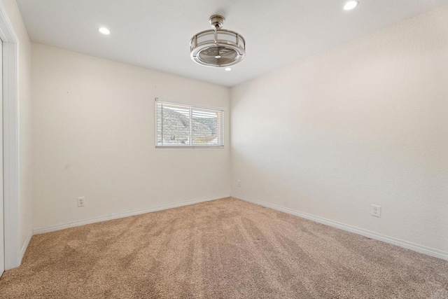 view of carpeted spare room