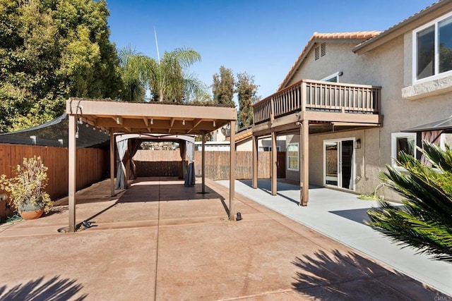 view of patio / terrace featuring a balcony