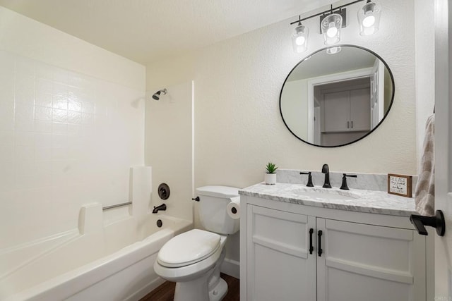 full bathroom featuring  shower combination, toilet, and vanity