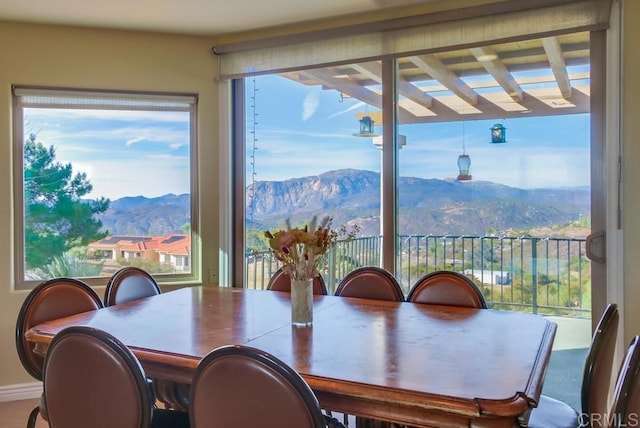 dining room with a mountain view