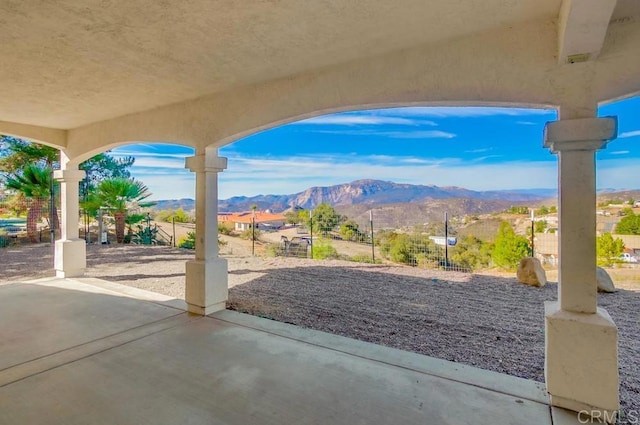 view of patio / terrace with a mountain view