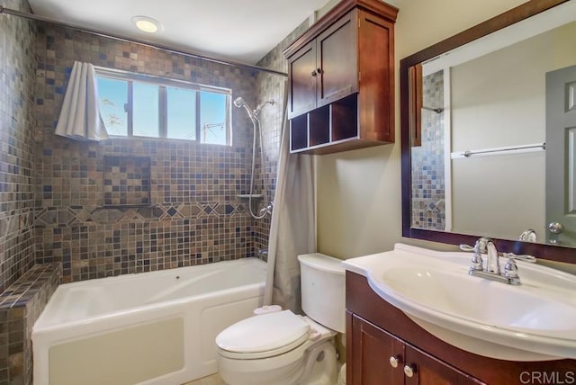 full bathroom featuring vanity, shower / tub combo with curtain, and toilet