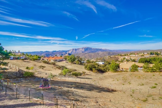 property view of mountains featuring a rural view