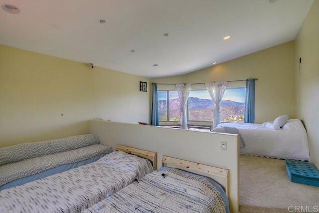 bedroom featuring lofted ceiling, recessed lighting, and light colored carpet