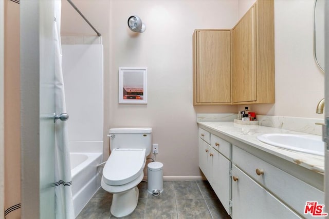 full bathroom featuring tile patterned floors, vanity, toilet, and shower / bath combination