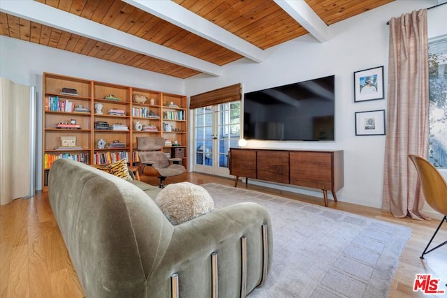 living room with beamed ceiling, wooden ceiling, french doors, and light hardwood / wood-style flooring