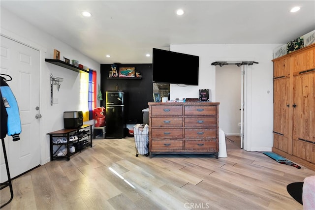 interior space with light hardwood / wood-style floors