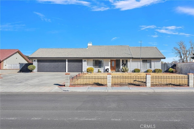 ranch-style home with a garage