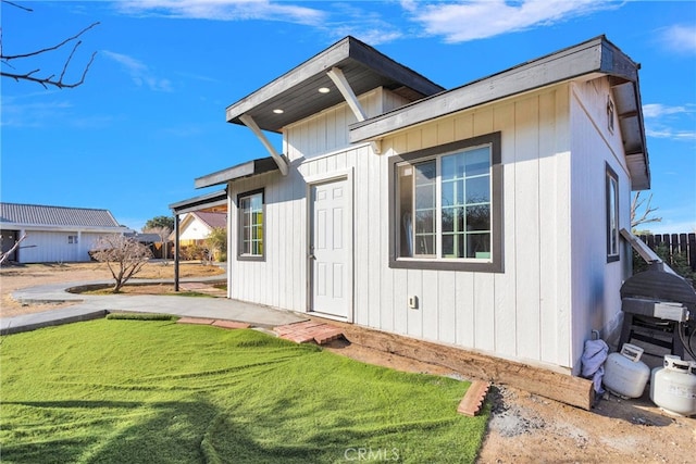 exterior space with a yard