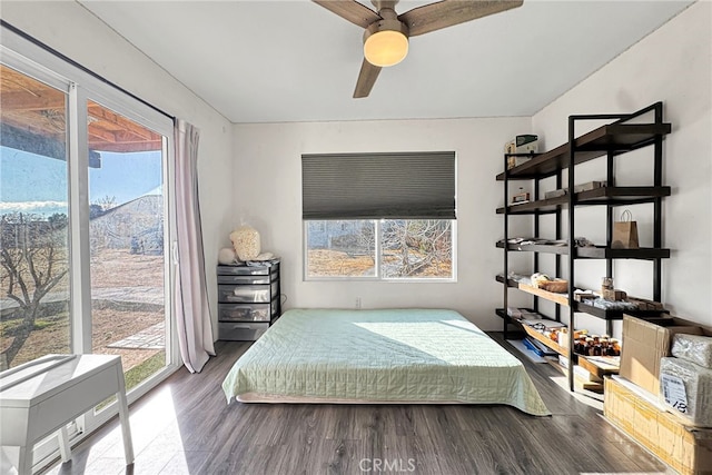 bedroom featuring wood-type flooring and ceiling fan