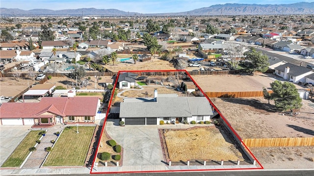 drone / aerial view featuring a mountain view