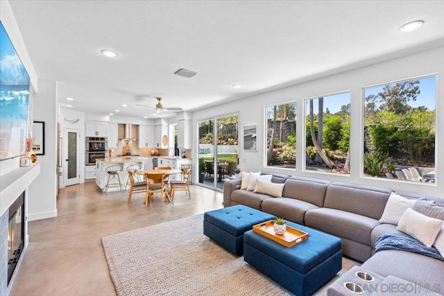 living room with ceiling fan