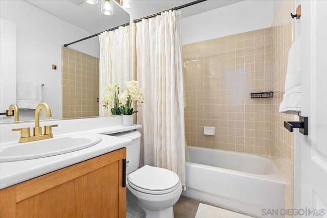 full bathroom featuring vanity, toilet, and shower / bathtub combination with curtain