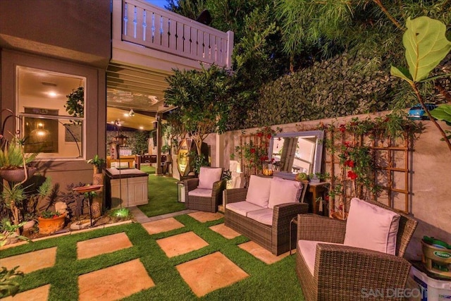 view of patio / terrace with a balcony and an outdoor hangout area