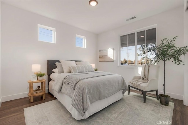 bedroom featuring wood-type flooring