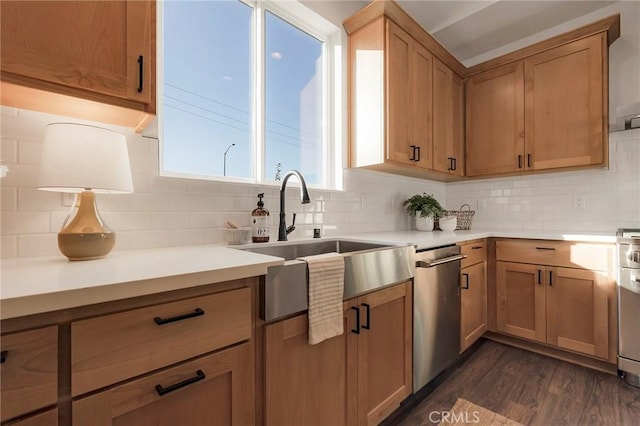 kitchen with dishwasher, sink, dark wood-type flooring, and decorative backsplash