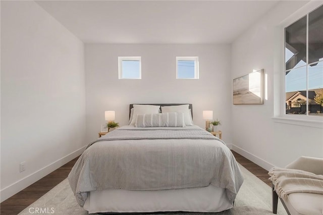 bedroom featuring dark hardwood / wood-style floors