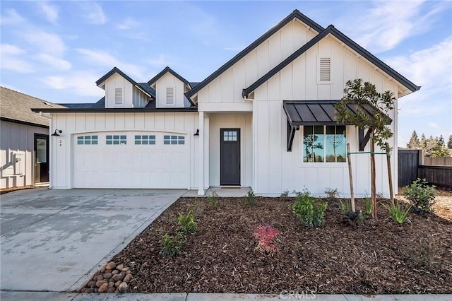 modern inspired farmhouse featuring a garage