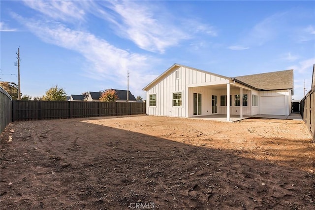 back of property featuring a patio