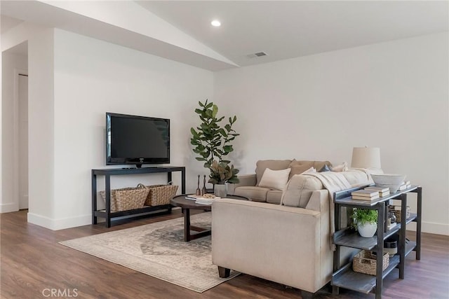 living room with lofted ceiling and hardwood / wood-style floors