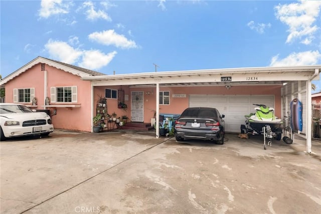 ranch-style house featuring a garage