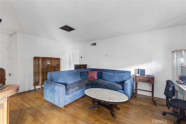 living room with hardwood / wood-style flooring