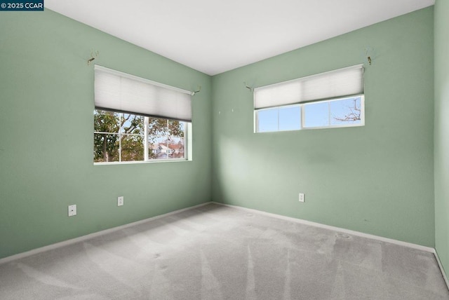 view of carpeted spare room