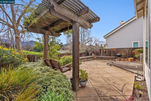 view of patio featuring a pergola