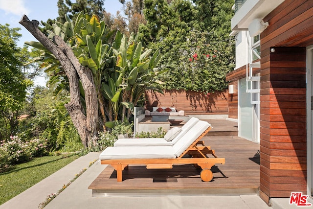 view of patio with a wooden deck