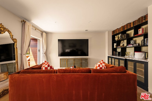 living room with hardwood / wood-style flooring