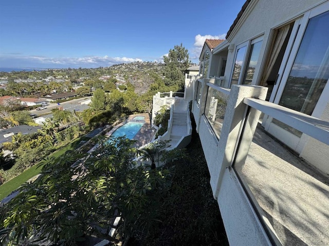 view of property exterior featuring a balcony