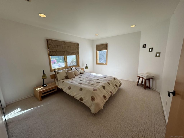 bedroom with light carpet