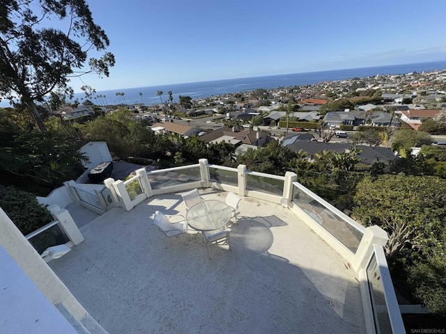 view of patio featuring a water view