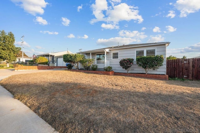 ranch-style house featuring a garage