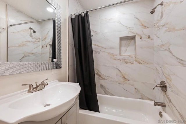 bathroom with vanity and shower / bath combination with curtain