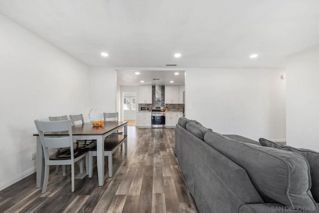 living room featuring dark hardwood / wood-style floors