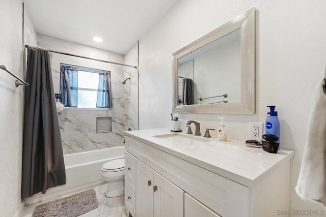 full bathroom with vanity, toilet, and shower / bath combo