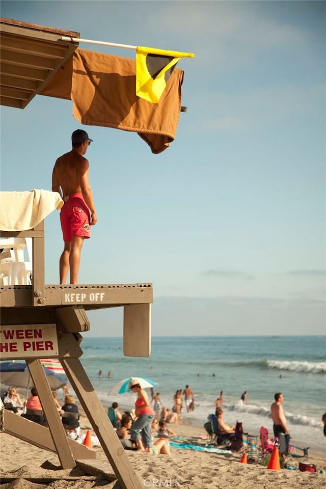 exterior space featuring a beach view