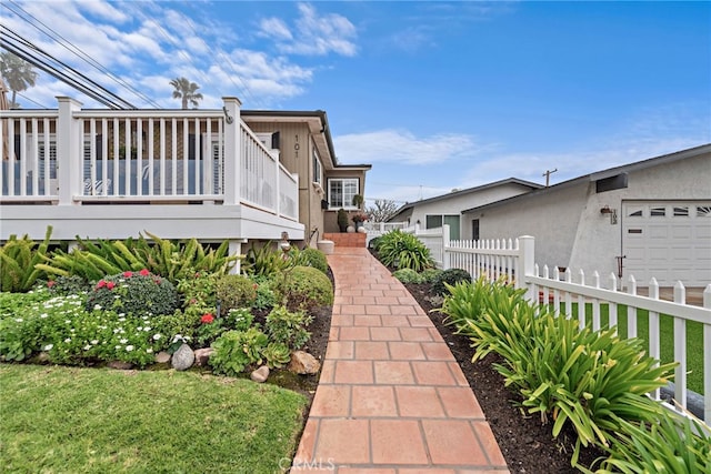 view of side of home with a yard