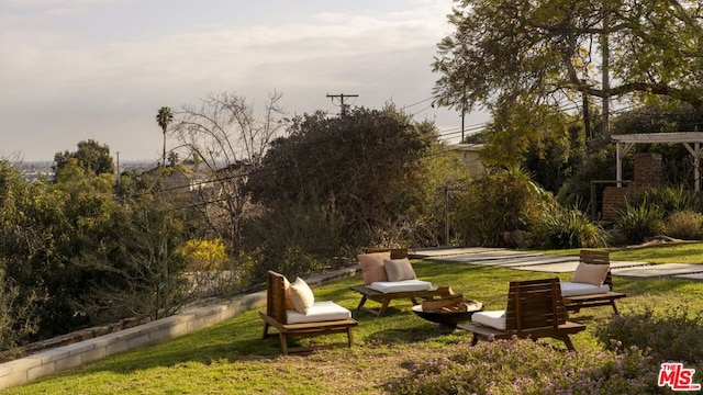 view of home's community featuring a lawn